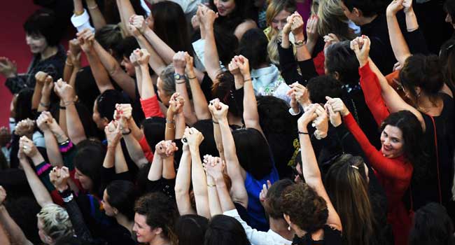 'Let's climb!' Female Stars Call For Equal Pay In Cannes Protest