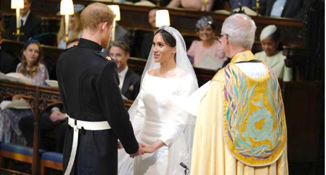 Prince Harry, Meghan Hold Hands At Emotional Wedding Service img