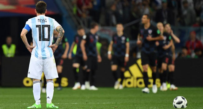 Argentina's forward Lionel Messi (2ndL) reacts after Croatia scored their third goal during the Russia 2018 World Cup Group D football match between Argentina and Croatia at the Nizhny Novgorod Stadium in Nizhny Novgorod on June 21, 2018.  Dimitar DILKOFF / AFP