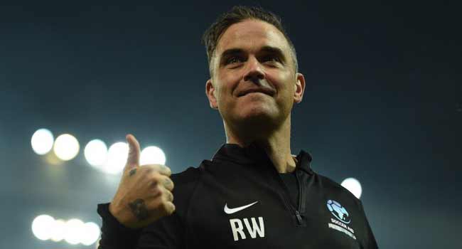 US Network Apologises For Robbie Williams World Cup Gesture