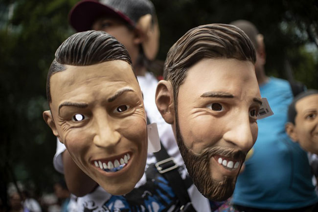 Ronaldo and Mess Masks Messi And Ronaldo Take Centre Stage As World Cup Enters Knockouts • Channels Television
