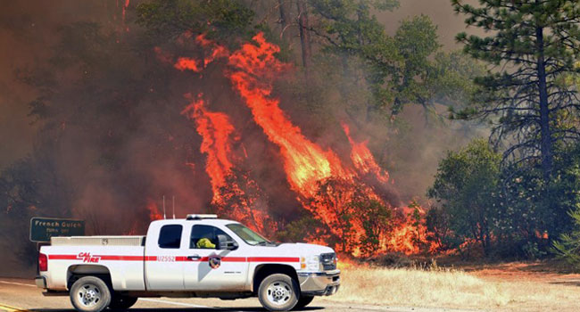 Thousands Flee New California After Deadly Wildfire