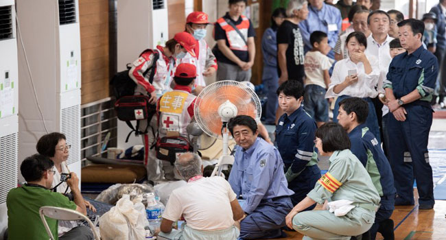 Japan PM with survivors Prime Minister Meets Survivors, As Rain Disaster Kills 204 In Japan • Channels Television