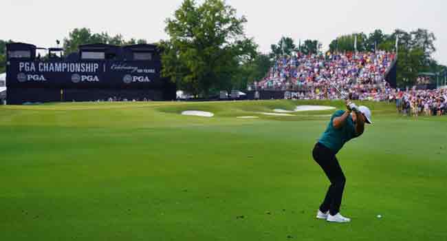 Koepka Holds Off Woods To Win 100th PGA Championship