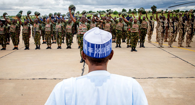 Buhari and troops 3 Buhari Vows To Ensure Bandits, Kidnappers, Others Are Not Spared • Channels Television