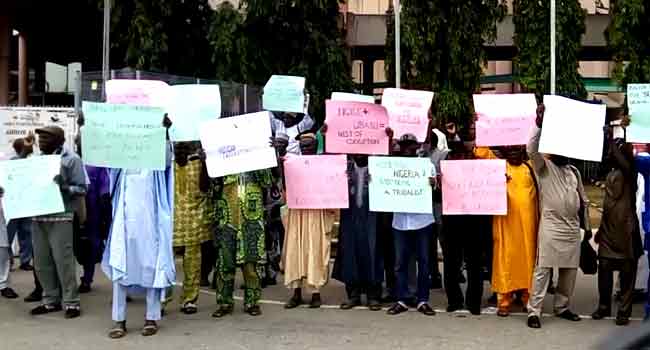 Pensioners Protest Unpaid Arrears, Seek Buhari’s Intervention