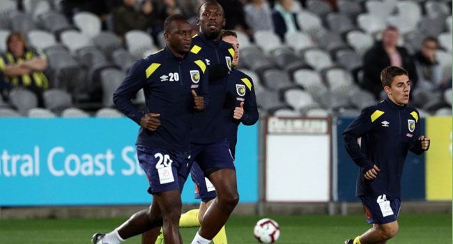 Usain Bolt Takes Break From Football Training