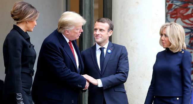 Macron, Trump In Show Of Unity After Row Over Europe's Defence