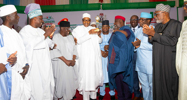 PHOTOS: President Buhari Receives Award From APC Governors Forum