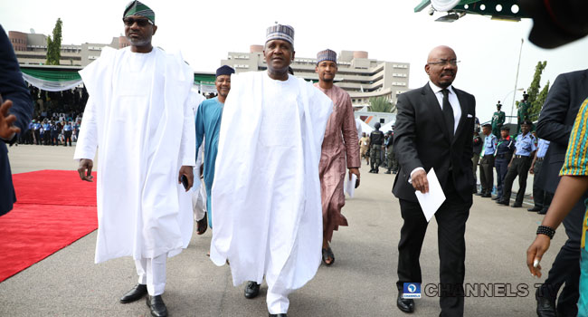 Femi Otedola, Aliko Dangote and Jim Ovia at the Eagle Square during Democracy Day celebration on June 12, 2019. PHOTO: Channels TV/Sodiq Adelakun.