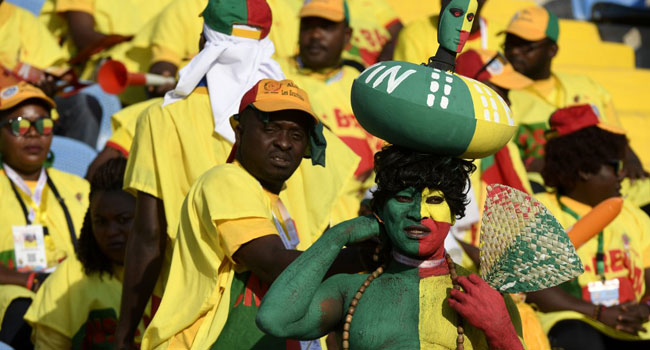 A Beninese fan cheers for his team prior to the 2019 Africa Cup of Nations (CAN) Round of 16 football match between Morocco and Benin at the Al-Salam Stadium in the Egyptian capital Cairo on July 5, 2019. PHOTO: Khaled DESOUKI / AFP