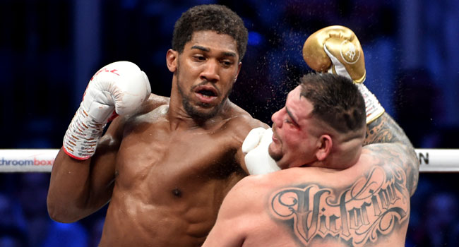 Anthony Joshua (left) is a British-Nigerian professional boxer who is a two-time unified heavyweight champion.