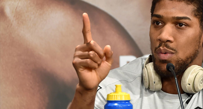 Heavyweight champion Anthony Joshua is pictured during a press conference in Ad Diriyah, a Unesco-listed heritage site, outside Riyadh. FAYEZ NURELDINE / AFP