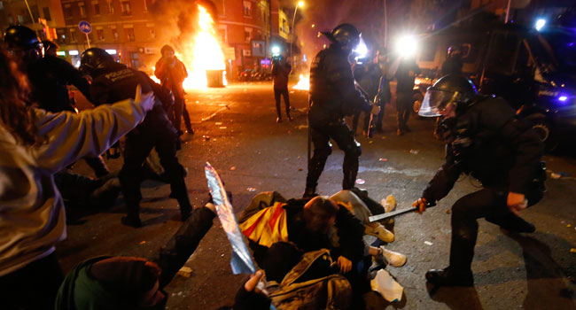 12 Injured As Police Clash With Catalan Protesters Outside Camp Nou Stadium