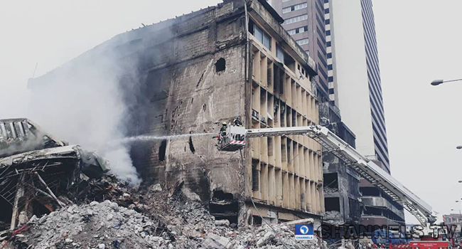 Firefighters battle a raging inferno at Balogun market in Lagos.