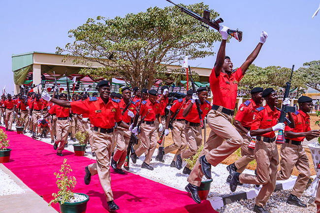 Officials jubilate at the Passing Out Parade ceremony of the Detective Inspector Course of the Economic and Financial Crimes Commission (EFCC). The passing out parade highlights months of intensive military training and grooming of the cadets, in preparation for a challenging and exciting career as EFCC operatives. PHOTO: Bayo Omoboriowo