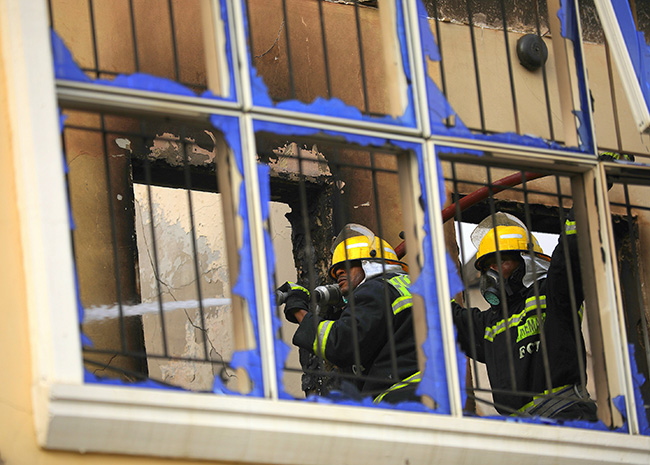 Fire fighters battling fire that gutted a petrol station along Kubwa Expressway in Abuja on Wednesday 26th February, 2020. Photo: Sodiq Adelakun/Channels TV