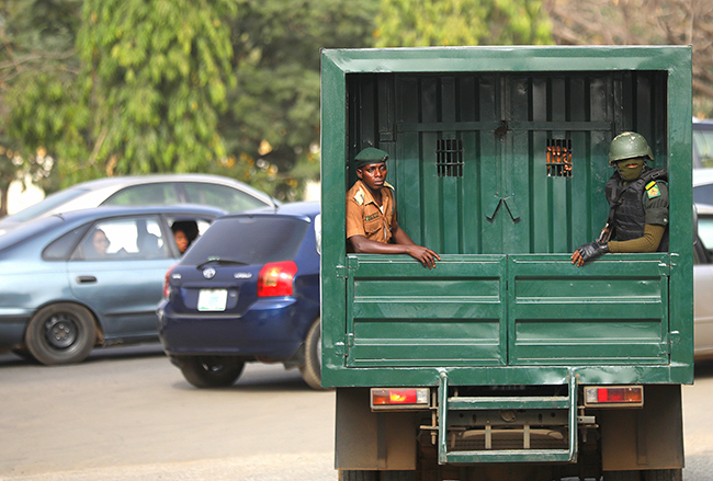 Men of the Nigeria Correction Service departs the Federal High Court in Abuja as they convey convicts to the Kuje Prison in Abuja. Photo: Sodiq Adelakun/Channels TV