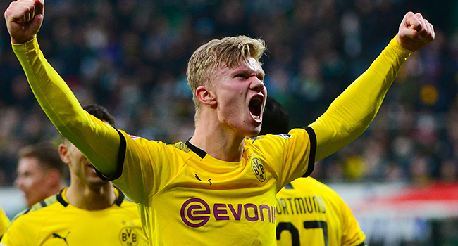 Dortmund's Norwegian forward Erling Braut Haaland celebrates after scoring during the German first division Bundesliga football match Werder Bremen vs BVB Borussia Dortmund, in Bremen, northern Germany on February 22, 2020. Patrik Stollarz / AFP