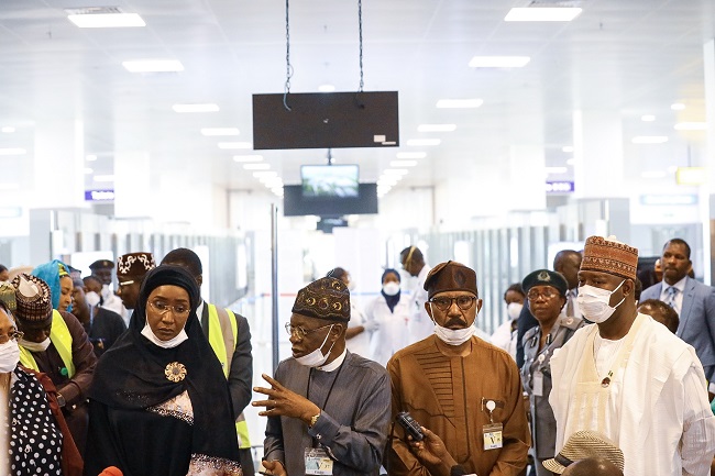 Minister of Information, Lai Mohammed; Minister for Aviation, Hadi Sirika; Minister of State for Health, Olorunnimbe Mamora; and Minister for Humanitarian Affairs, Disaster Management and Social Development, Sadiya Umar Farouk at the Nnamdi Azikwe International Airport to supervise the process and screening of passengers coming into the country in order to prevent Coronavirus spread. PHOTO: Sodiq Adelakun