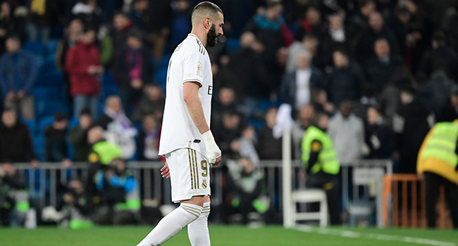 Real Madrid's French forward Karim Benzema leaves the pitch at the end of the Spanish Copa del Rey (King's Cup) quarter-final football match Real Madrid CF against Real Sociedad at the Santiago Bernabeu stadium in Madrid on February 06, 2020. JAVIER SORIANO / AFP