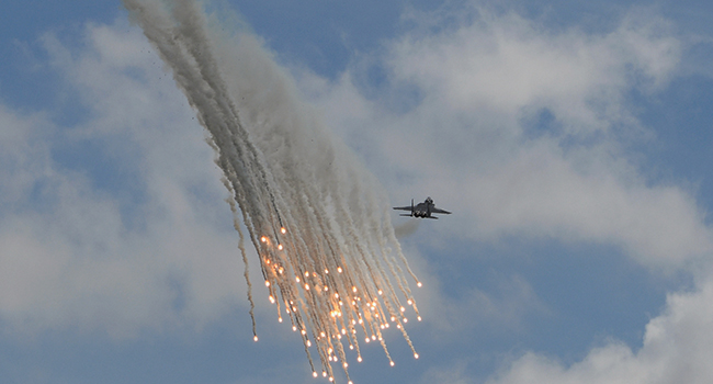 PICTURE USED TO ILLUSTRATE STORY: A Singapore Air Force F-15SG fighter jet participates in an aerial display at the Singapore Airshow in Singapore on February 13, 2020. ROSLAN RAHMAN / AFP