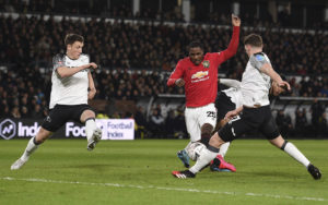 Manchester United's Nigerian striker Odion Ighalo scores his team's second goal during the English FA Cup fifth round football match between Derby County and Manchester United at Pride Park Stadium in Derby, central England on March 5, 2020. Photo: Oli Scarff / AFP