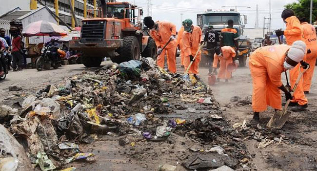 Highway sweepers in action, during the clean-up and evacuation of refuse exercise along Apapa-Wharf corridor, organised by APM terminals in partnership with LAWMA, at Apapa, on Thursday, 26thSept., 2019.