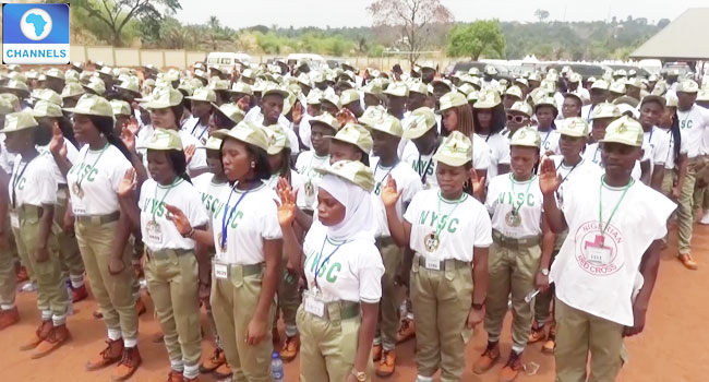 A file photo of National Youth Service Corp members on a field.