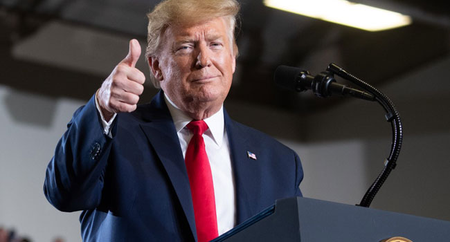In this file photo US President Donald Trump gives a thumbs up during a "Keep America Great" campaign rally at Wildwoods Convention Center in Wildwood, New Jersey, January 28, 2020.