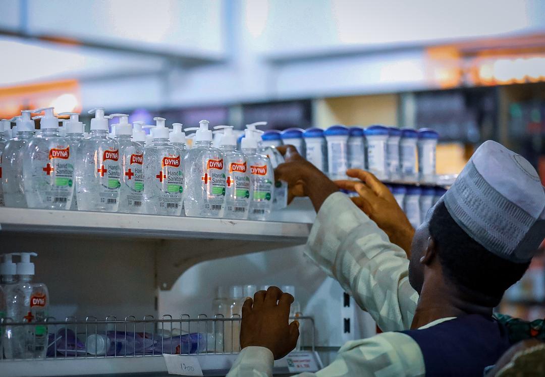 People shopping for hand sanitizer at a store in Abuja following the continuous spread of the Corona Virus on Friday, March 20th 2020. Photo: Sodiq Adelakun / Channels TV