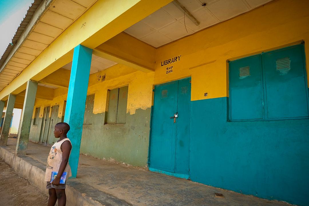  A boy stands outside a closed primary school in Abuja on Monday, March 23, 2020. Channels Television/ Sodiq Adelakun.