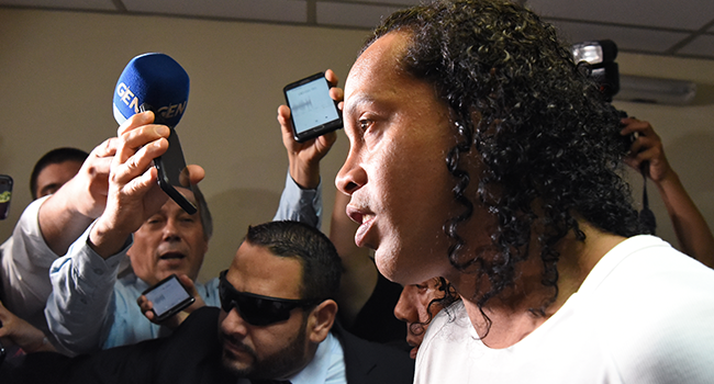 Brazilian retired football player Ronaldinho arrives at Asuncion's Justice Palace to testify about his irregular entry to the country, in Asuncion, on March 6, 2020. Norberto DUARTE / AFP