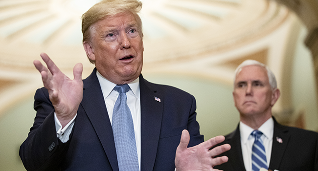 U.S. President Donald Trump talks to reporters at the Capitol after attending the Senate Republicans weekly policy luncheon with Vice President Mike Pence (R) on March 10, 2020 in Washington, DC. Samuel Corum/Getty Images/AFP