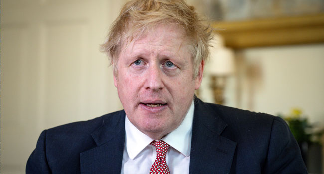 In this file photo taken on April 12, 2020 A handout image released by 10 Downing Street, shows Britain's Prime Minister Boris Johnson as he delivers a television address after returning to 10 Downing Street after being discharged from St Thomas' Hospital, in central London on April 12, 2020. Pippa FOWLES / 10 Downing Street / AFP