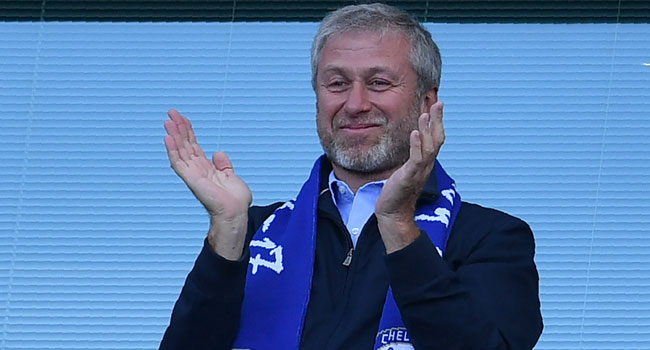 In this file photo taken on May 21, 2017 Chelsea's Russian owner Roman Abramovich applauds, as players celebrate their league title win at the end of the Premier League football match between Chelsea and Sunderland at Stamford Bridge in London. Ben STANSALL / AFP