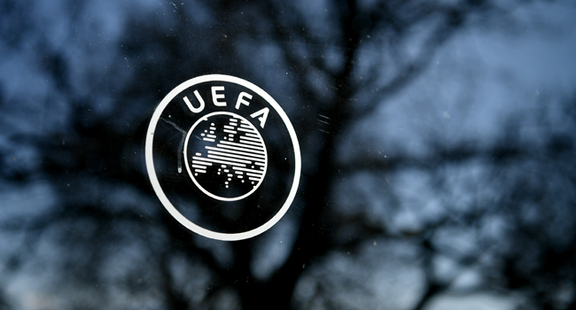 (FILES) In this file photo taken on February 28, 2020 shows the UEFA logo at the organization's headquarters in Nyon. Fabrice COFFRINI / AFP