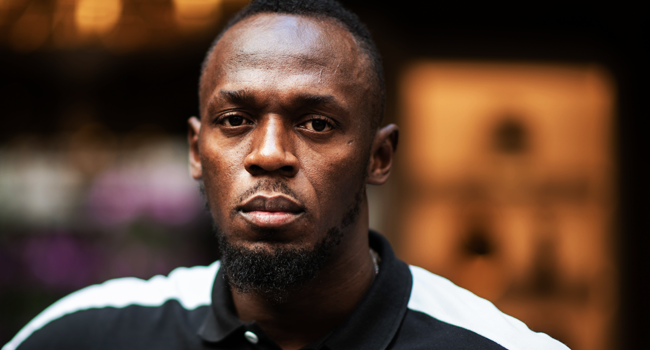 In this file photo Jamaican Olympic sprinter Usain Bolt poses during a photo session as he launches a new brand of electric scooters named "Bolt" in Paris, on May 15, 2019. Martin BUREAU / AFP