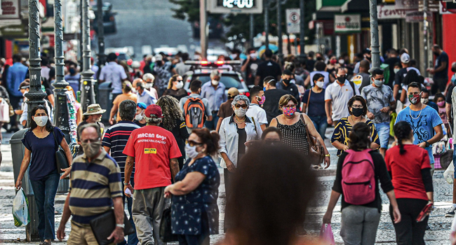 View of a crowded street in Florianopolis, Santa Catarina state, Brazil, on May 12, 2020 amid the Covid-19 coronavirus pandemic. EDUARDO VALENTE / AFP