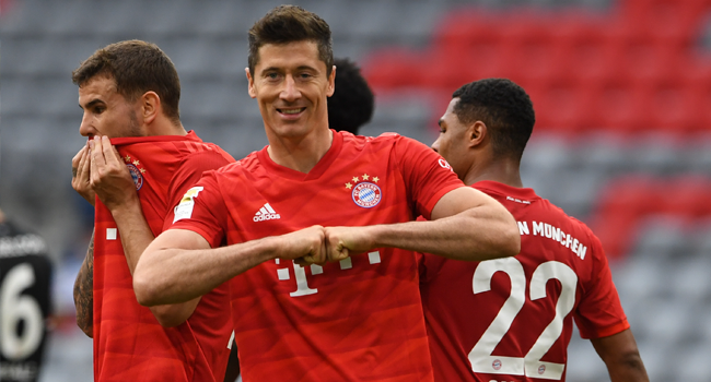 Bayern Munich's Polish forward Robert Lewandowski celebrates the 3-0 during the German first division Bundesliga football match FC Bayern Munich v Fortuna Duesseldorf on May 30, 2020 in Munich, southern Germany. Christof STACHE / AFP / POOL