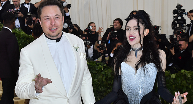 In this file photo taken on May 7, 2018 Elon Musk and Grimes arrive for the 2018 Met Gala, at the Metropolitan Museum of Art in New York. ANGELA WEISS / AFP