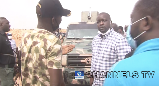Borno State Deputy Governor, Usman Kadafur (2nd R) confronts a military official on June 13, 2020