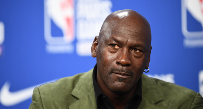 In this file photo taken on January 24, 2020 former NBA star and owner of Charlotte Hornets team Michael Jordan looks on as he addresses a press conference ahead of the NBA basketball match between Milwaukee Bucks and Charlotte Hornets at The AccorHotels Arena in Paris. FRANCK FIFE / AFP