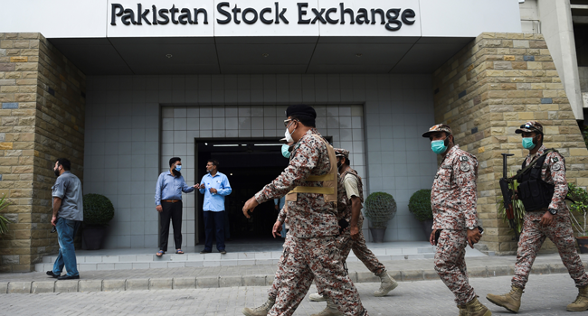 Paramilitary officers inspect the premisses of the Pakistan Stock Exchange building following an attack by gunmen in Karachi on June 29, 2020. Rizwan TABASSUM / AFP