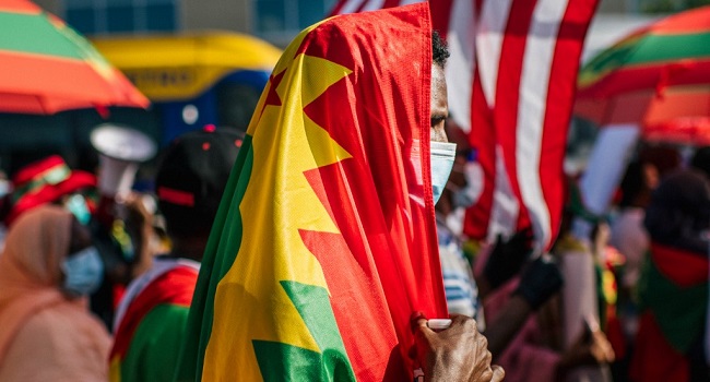 Members of the Oromo community march in protest after the death of musician and revolutionary Hachalu Hundessa on July 8, 2020 in St. Paul, Minnesota. The protesters called for Internet service to be restored in Ethiopia that was shut down on June 30. Community leaders also urged the U.S. to aid in the release of Oromian and American prisoners. This latest protest follows the death of Hundessa, who was murdered in Ethiopia on June 29. His death has sparked ongoing protests around the world. Brandon Bell/Getty Images/AFP