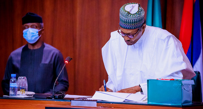 Buhari Signs Revised 2020 Budget Into Law – Channels Television