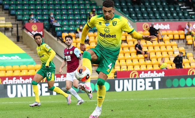 Norwich City's English midfielder Ben Godfrey scores an own goal during the English Premier League football match between Norwich City and Burnley at Carrow Road stadium in Norwich, eastern England on July 18, 2020. (Photo by Julian Finney / POOL / AFP)