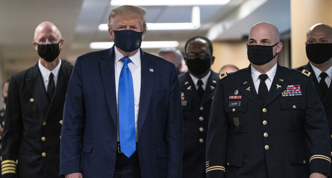 As Virus Rages In US, Trump Finally Wears A Mask