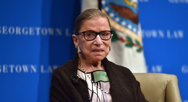 (FILES) In this file photo taken on September 20, 2017 US Supreme Court Justice Ruth Bader Ginsburg looks on as she speaks to first year Georgetown University law students in Washington, DC. - US Supreme Court Justice Ruth Bader Ginsburg, the 87-year-old anchor of its liberal faction, has been discharged from hospital on July 15, 2020 US media reported, after being hospitalized for a suspected infection on July 14. (Photo by Nicholas Kamm / AFP)