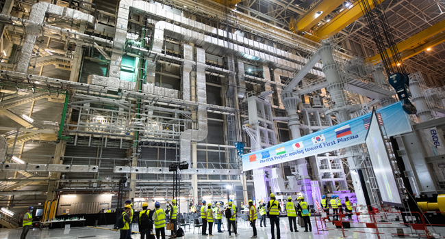 A picture shows a general view of the assembly hall during the launch of the assembly stage of nuclear fusion machine "Tokamak" of the International Thermonuclear Experimental Reactor (ITER) in Saint-Paul-les-Durance, southeastern France, on July 28, 2020. CLEMENT MAHOUDEAU / AFP